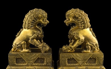 A pair of Chinese gilt-bronze lions, 18th century