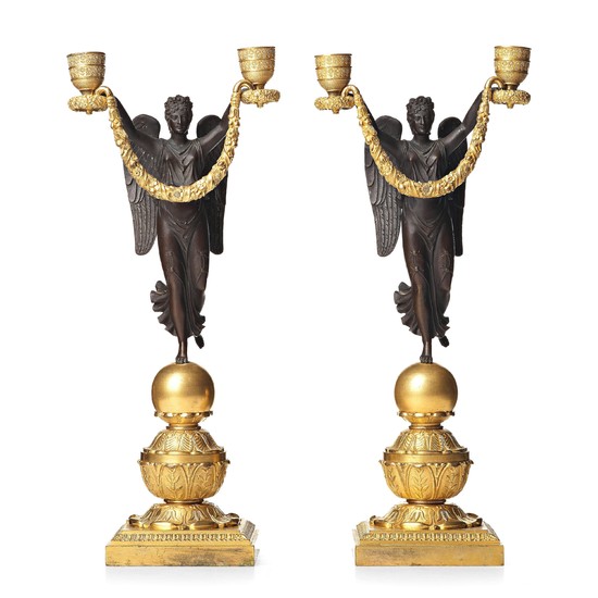 A pair of Empire two-light candlesticks, beginning of the 1800's.