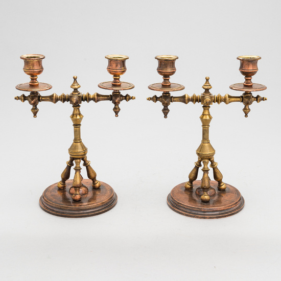 A pair of Imperial Russian brass candelabra, 1870s-1880s.