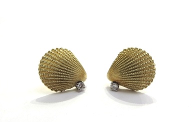 A pair of Tiffany and Co yellow gold earrings as shells with...