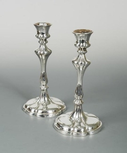 A pair of Victorian silver plated candlesticks