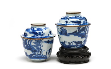 A pair of blue and white porcelain Jibo covered teacups painted with landscape design