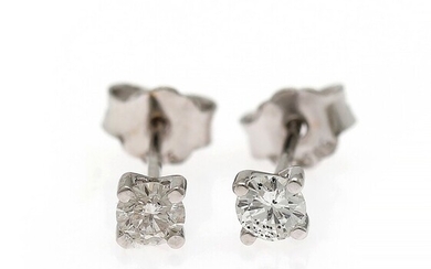NOT SOLD. A pair of diamond ear studs each set with a brilliant-cut diamonds weighing...