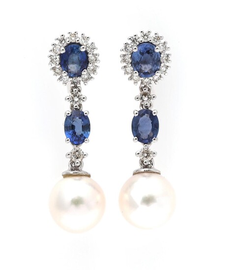 NOT SOLD. A pair of ear pendants each set with two sapphires, a cultured pearl encircled by numerous diamonds, mounted in 18k white gold. L. app. 3 cm. (2) – Bruun Rasmussen Auctioneers of Fine Art