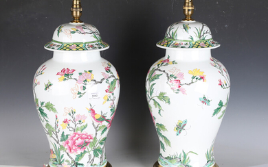 A pair of late 20th century French porcelain table lamps, decorated in the Chinese style, the unders