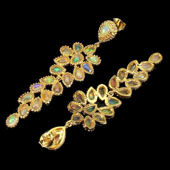 NOT SOLD. A pair of opal ear pendants each set with numerous cabochon opals, mounted in gilded sterling silver. L. app. 6.6 cm. (2) – Bruun Rasmussen Auctioneers of Fine Art