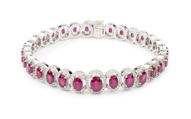 A ruby and diamond cluster line bracelet, composed of thirty...