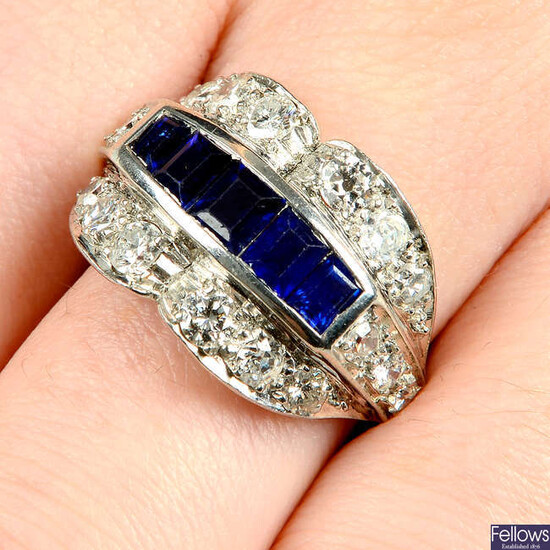 A sapphire and brilliant-cut diamond dress ring.