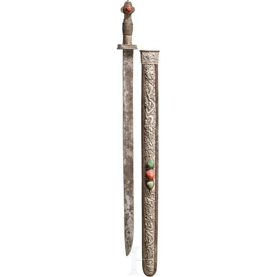 A silver-mounted Tibetan sword, set with corals and