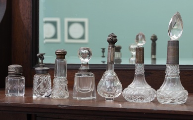 A suite of sterling silver topped dressing table bottles, some chips, tallest Height 16cm