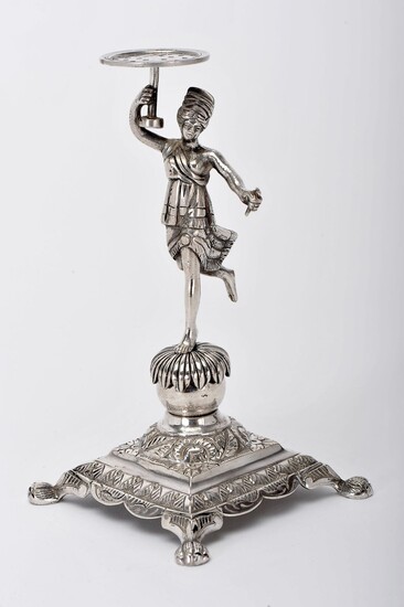 A toothpick holder "Dancer in turban holding a cup"