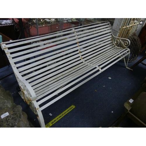A vintage wrought iron white painted Garden Bench, with scro...