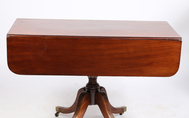 AN EARLY 19TH CENTURY MAHOGANY DROP LEAF TABLE.