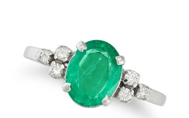 AN EMERALD AND DIAMOND RING set with an oval cut emerald of approximately 1.98 carats, accented on