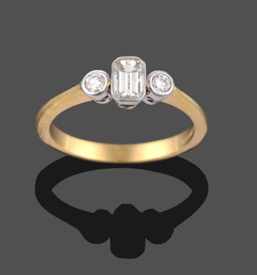 An 18 Carat Gold Diamond Three Stone Ring, an emerald-cut...