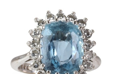 An 18ct white gold aquamarine and diamond cluster ring