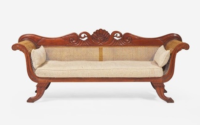 An Anglo-Colonial carved hardwood and caned sofa, first half 19th century