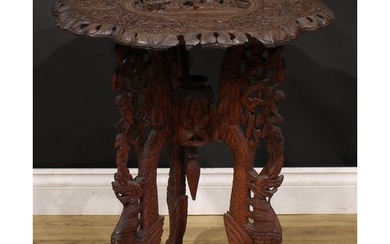 An Anglo-Indian hardwood occasional table, shaped circular t...