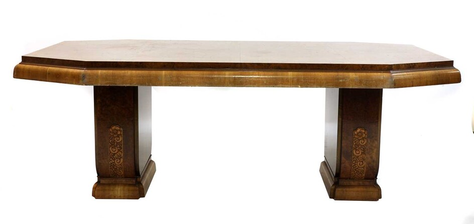 An Art Deco burr walnut dining table