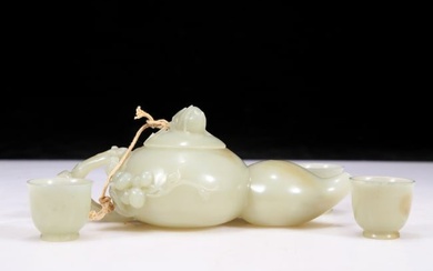 An Exquisite White Jade Gourd-Form Teapot With Three Teacups