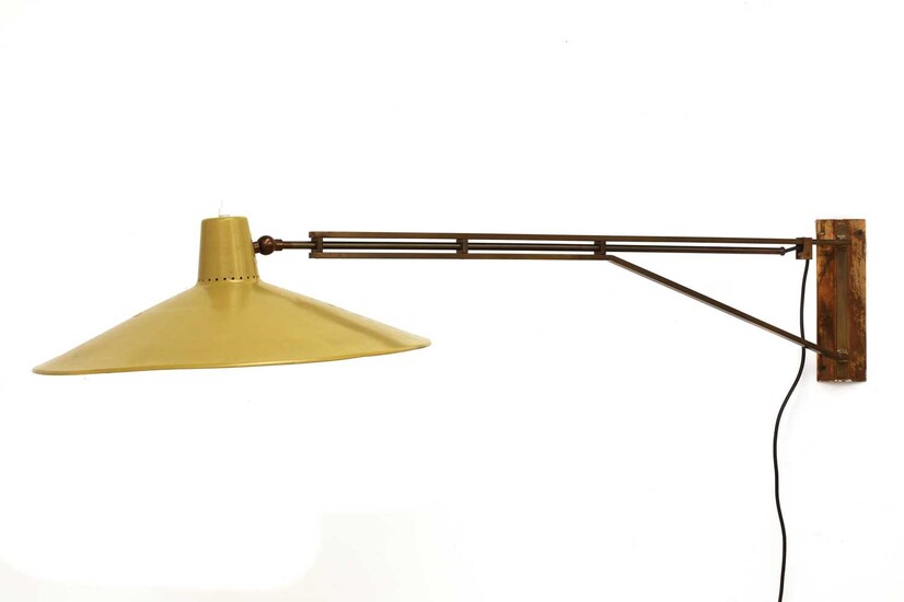 An Italian adjustable brass wall light