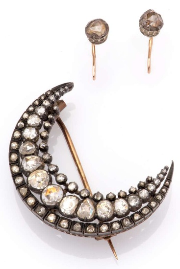 An antique 18k gold and silver diamond crescent brooch and a pair of earrings.
