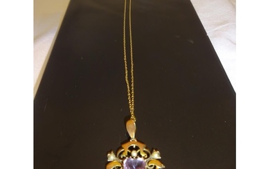 An antique 9ct gold amethyst and pearl pendant.