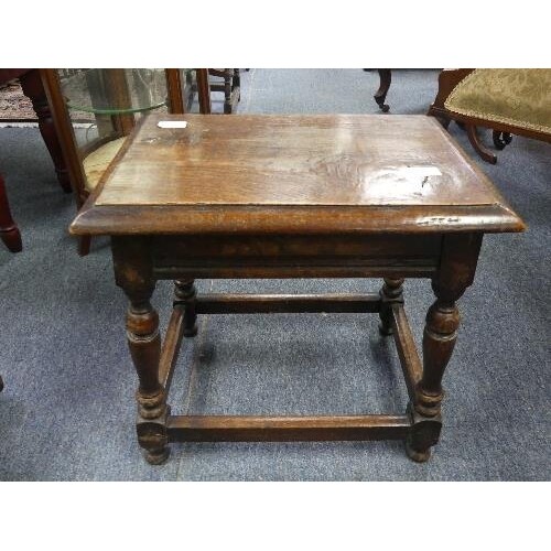 An antique oak joint Stool, the rectangular seat with moulde...