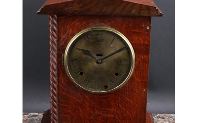 An early 20th century oak officer’s mess type mantel clock, ...