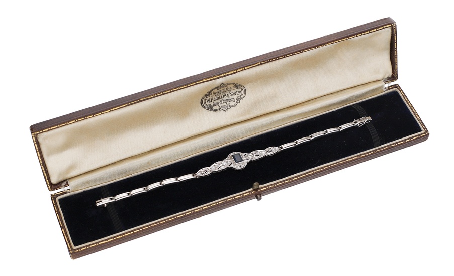 An early 20th century sapphire and diamond bracelet, the rectangular step-cut sapphire...