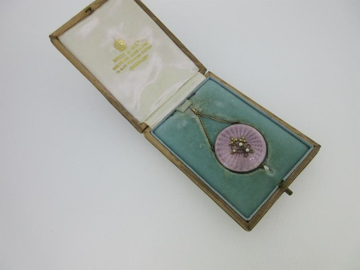 An enamel and seed pearl pendant in original fitted