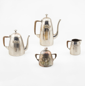 Art Nouveau set of teapot, coffee pot, milk jug and sugar bowl in silver-plated metal, early 20th Century.