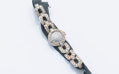 Bracelet montre de dame en platine (950 millièmes),...