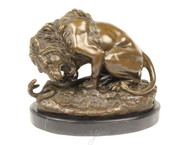 Bronze sculpture of a lion attacking a snake (serpent)