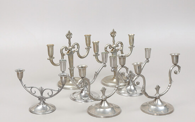 CANDLESTICKS, 7 pcs. , pewter, first half of the 20th century.