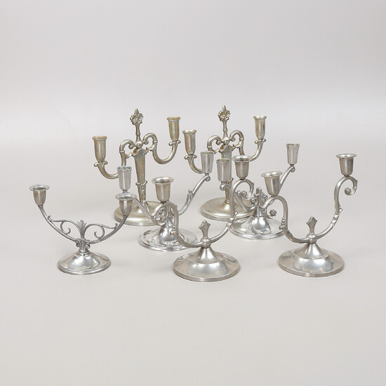 CANDLESTICKS, 7 pcs. , pewter, first half of the 20th century.