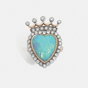 CIRCA 1950 OPAL RING A heart-shaped opal, diamond,...