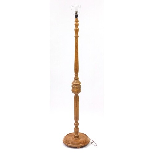 Carved oak standard lamp, 158cm high