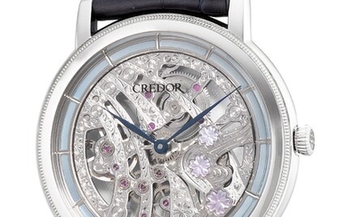 Credor, Ref. GBBD965 An extremely fine and rare limited edition platinum and mother of pearl skeletonized wristwatch with mother of pearl cherry blossoms, hand engraved bridges, guarantee, tapestry, fitted presentation box and outer packaging...