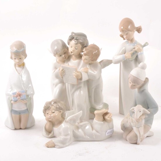 Five Llado figures, angels, children.