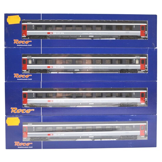Four Roco HO model railway passenger coaches