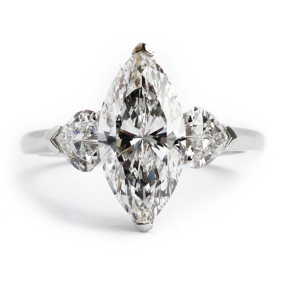 SOLD. Graff: A diamond ring set with a marquise-cut diamond weighing 2.30 ct. flanked by two brilliant-cut heart-shaped diamond. F/VVS. GIA report. – Bruun Rasmussen Auctioneers of Fine Art
