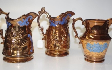 Group three antique copper lustre table jugs