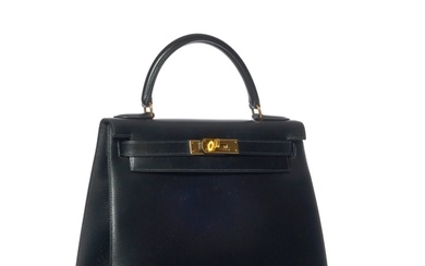 Hèrmes 1995 A Kelly 28 black box calf leather handbag With t...