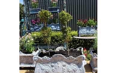 Large antique French cast iron garden planter. Cast in relie...