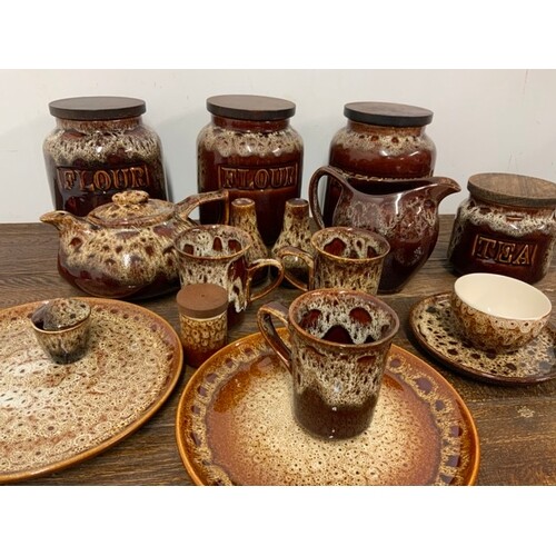 Large quantity of Foster treacle pottery ware