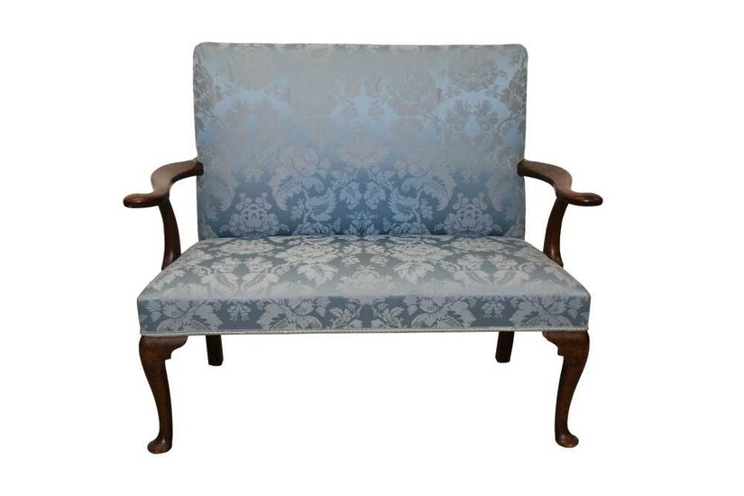 Mid 18th century walnut sofa with scrolled arms and blue silk damask upholstery