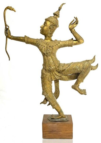 Origin Burma. Ancient statue in gilded bronze. Archer
