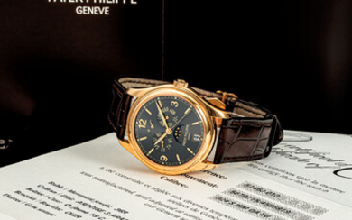 PATEK PHILIPPE. AN 18K GOLD AUTOMATIC ANNUAL CALENDAR WRISTWATCH WITH SWEEP CENTRE SECONDS, MOON PHASES AND POWER RESERVE