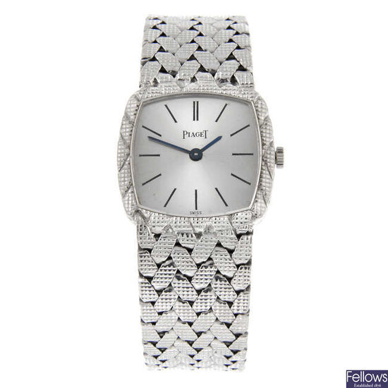 PIAGET - a lady's white metal bracelet watch.